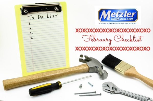empty to do list with several tools and the metzler home builders logo with "february checklist" written