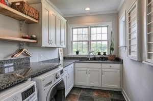 laundry room with cabinets