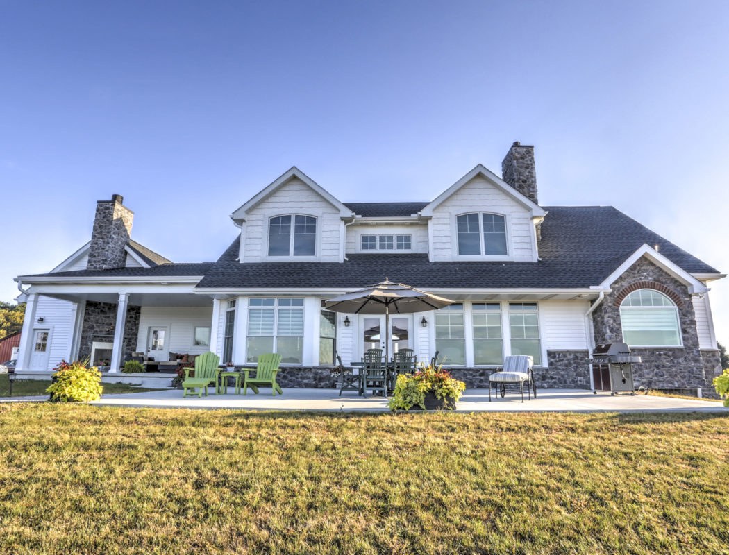 custom story and a half home exterior
