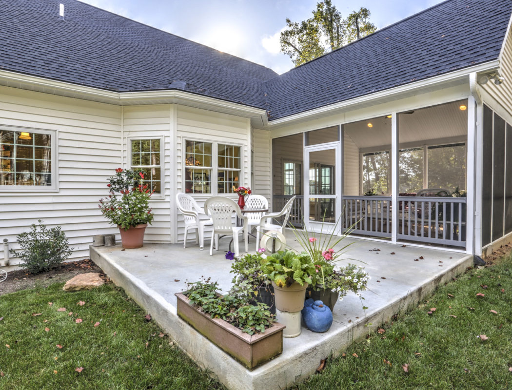 small patio next to a sunroom