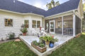 small patio next to a sunroom