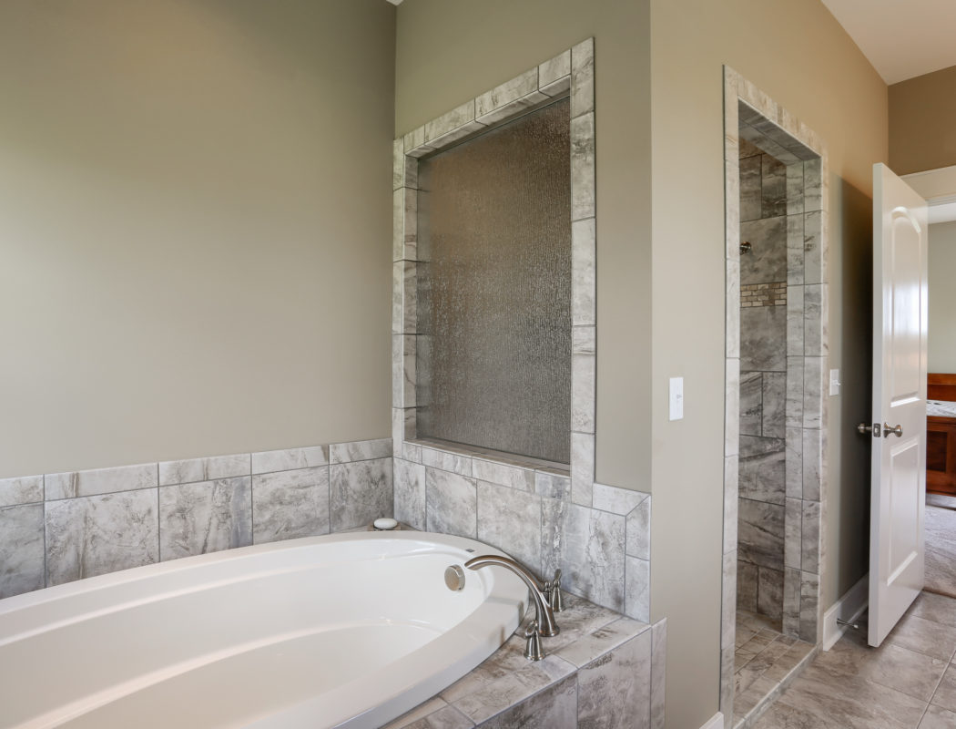 a new metzler bathroom with large tub