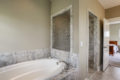 a new metzler bathroom with large tub