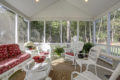 seating area inside of a screened porch