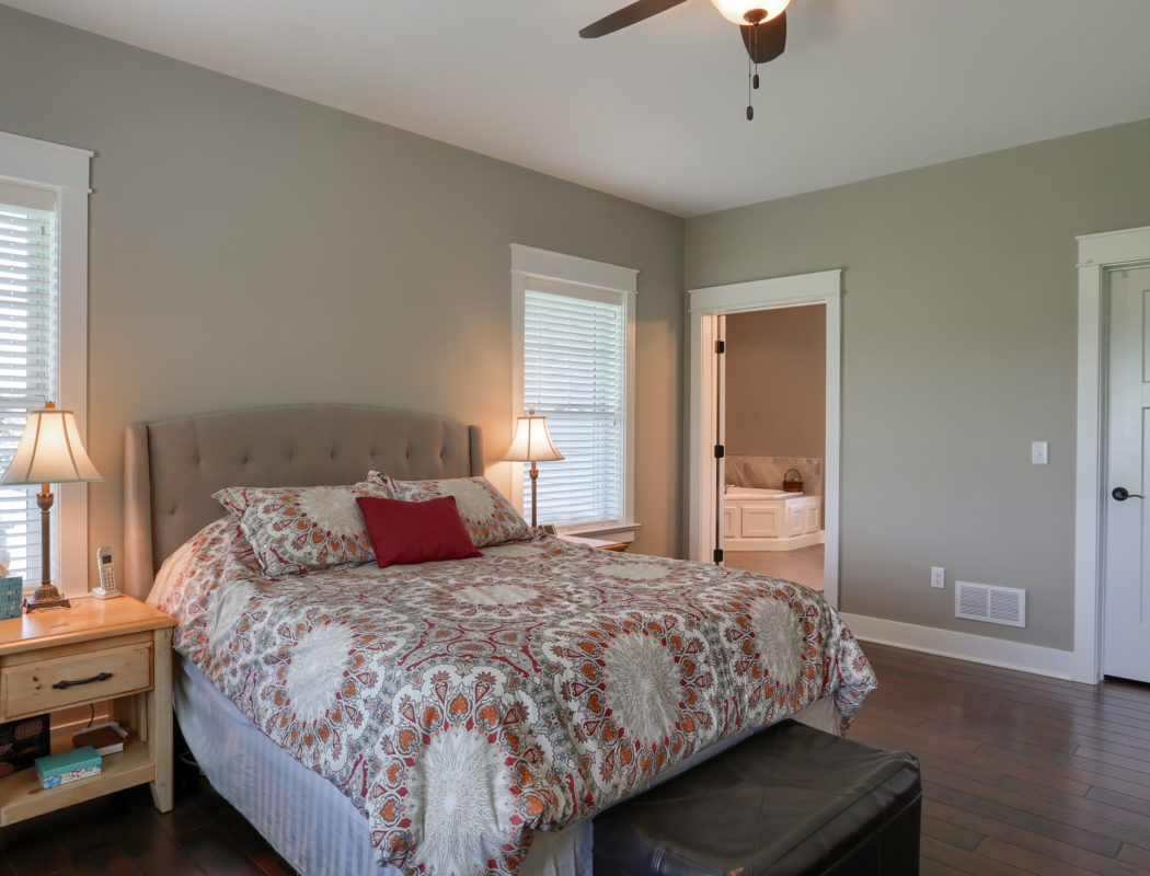 Bedroom with master bath in the background