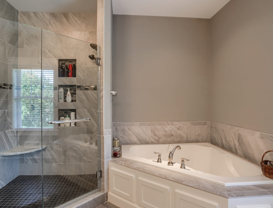 walk-in shower and soak tub