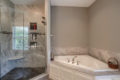 walk-in shower and soak tub