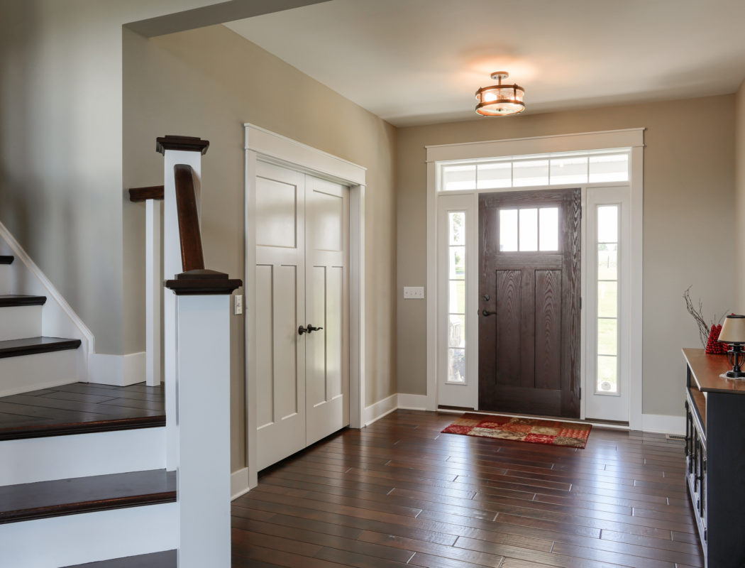 entryway inside the home and staircase to 2nd floor