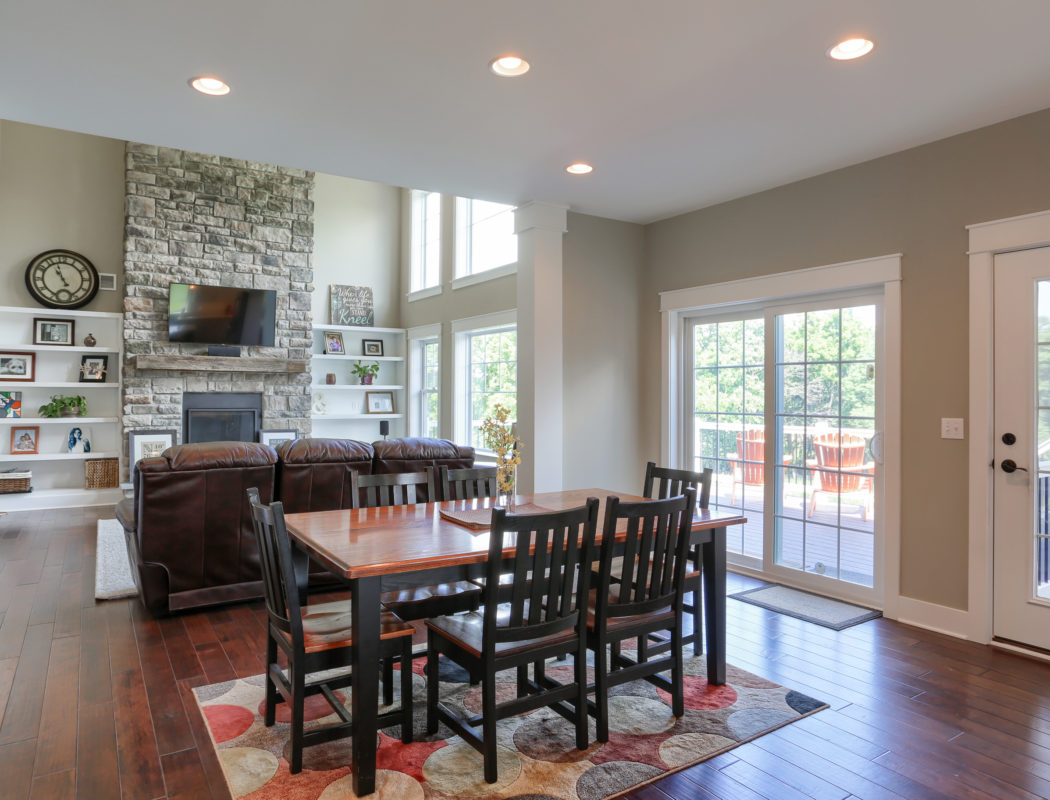 dining area and living room with lots of natural lighting