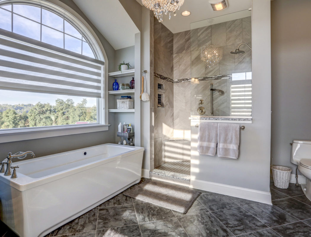 master bath with tub and walk-in shower