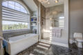 master bath with tub and walk-in shower