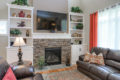 close up of stone fireplace and shelving that stands beside it