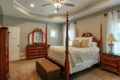 furnished master bedroom suite