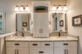 his/her vanities in a large master bathroom