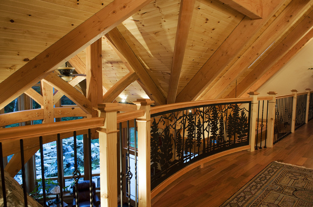custom woodwork on railing and ceiling
