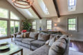 vaulted ceiling family room with skylights