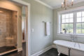 country farmhouse tub and walk-in shower