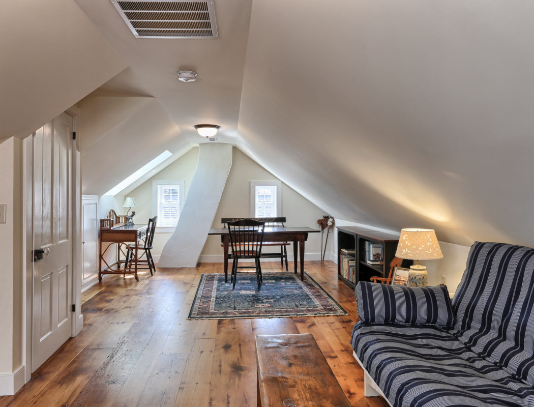 a finished and furnished attic