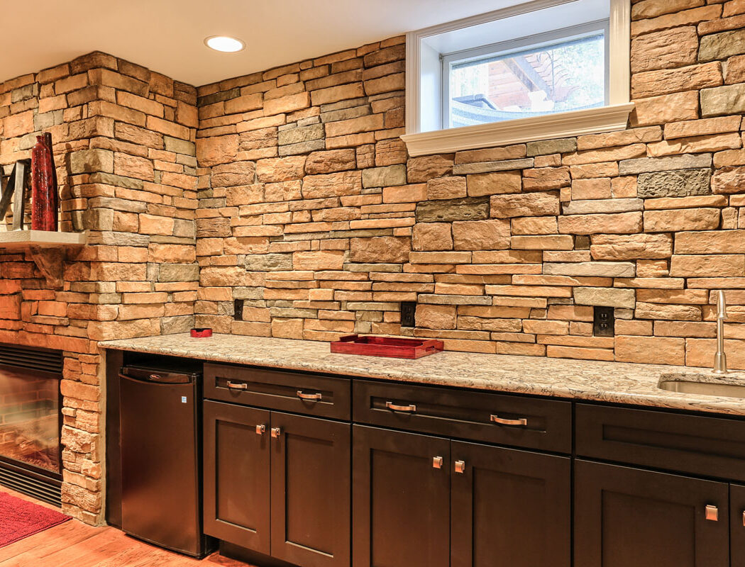 stone wall above kitchen countertops