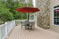 patio set with umbrella on a porch