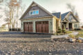 one story home - garage exterior - Built by Metzler Home Builders