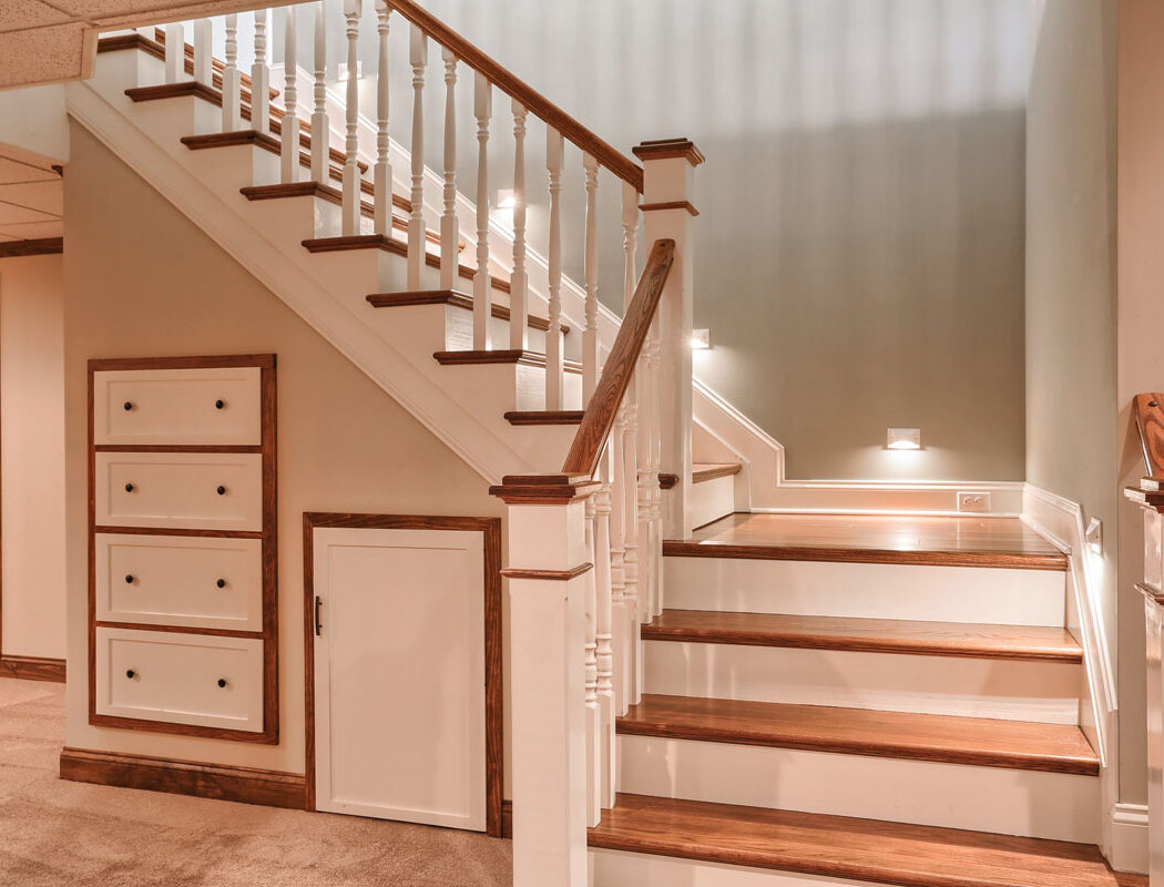 custom staircase with built in storage area