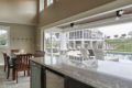 bar and dining area inside a pool house