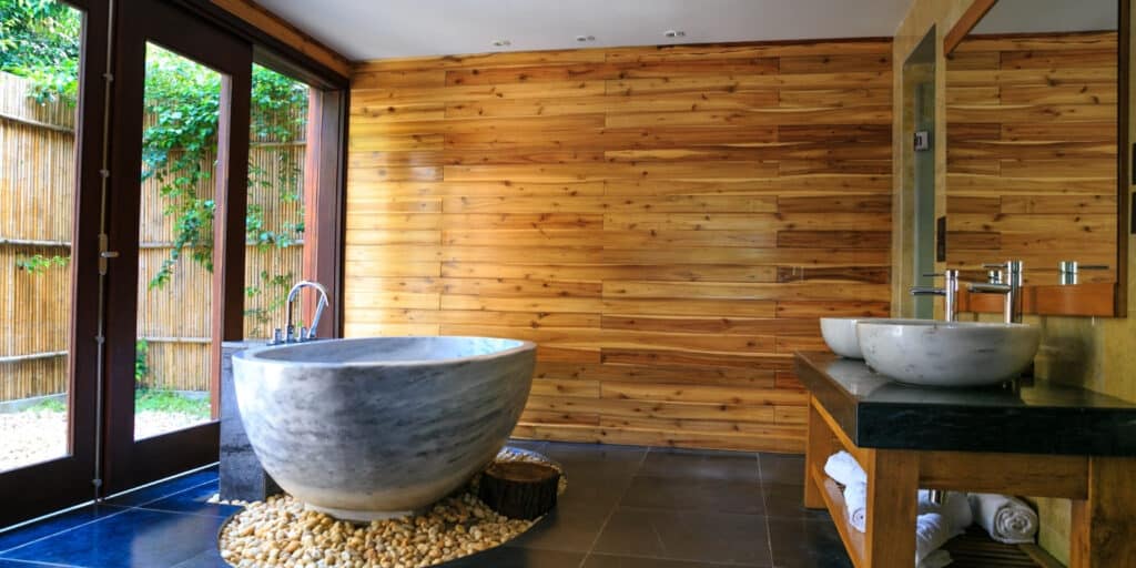 biophilic bathroom with tub and windows