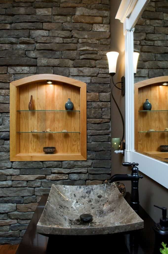 biophilic bathroom sink and shelves in wall